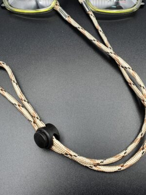 WhatsApp Image 2025-08-15 at 12.00.34 AM سلسلة نظارات قماش بيج بخطوط بنية وسوداء – عملية وأنيقة